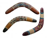Three decorated boomerangs with Aboriginal-style art on white background.