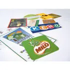Assorted colorful stickers and cards scattered on a white surface.