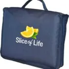 A blue fabric bag with a handle, featuring a logo of orange slices and the text Slice of Life printed on the front.