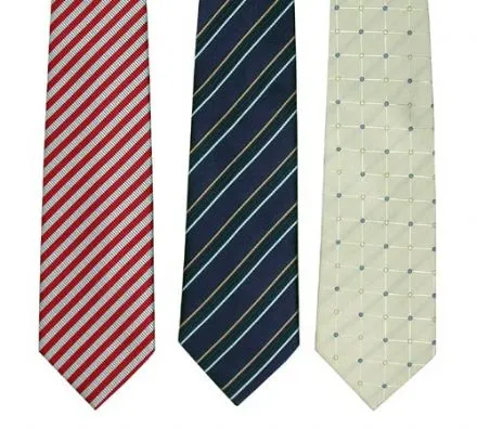 Three neckties: red striped, blue with diagonal stripes, and cream with a grid pattern.