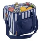A blue and white striped cooler bag filled with various items, including apples, oranges, a can of sports drink, a bottle, and other beverages. It has a shoulder strap and a front zippered pocket.