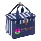 A blue and white striped insulated cooler bag with navy blue handles and a front pocket. The bag features a colorful circular logo and the text Benchmark Specialist Property Managers on the front.