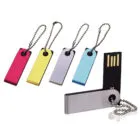 Five colorful USB flash drives with keychains, one opened to reveal the USB connector.