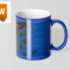 Blue mug with text and abstract designs; new label in orange at top left.
