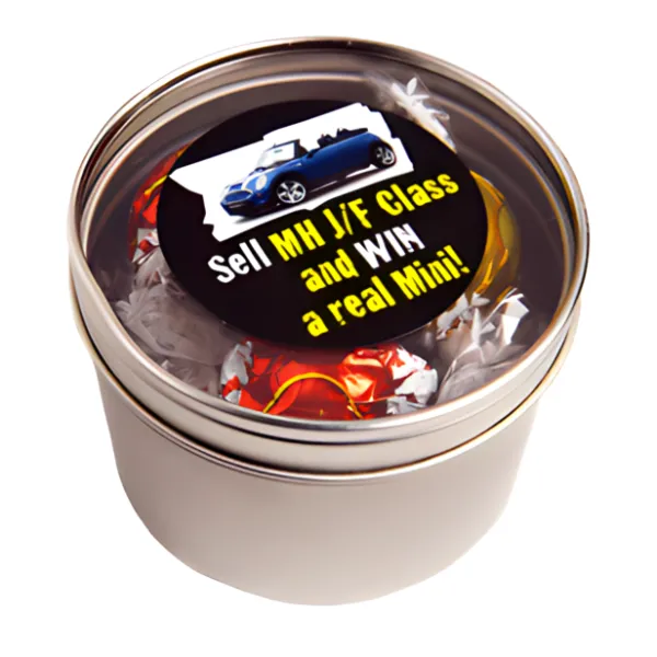 A tin of wrapped candies with a sticker promoting a chance to win a Mini car.