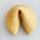 A single fortune cookie on a plain white background.