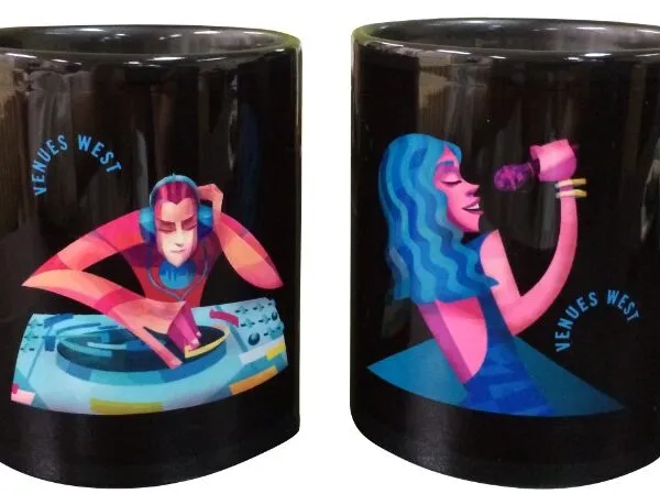 Two black mugs with colorful illustrations of a DJ and a singer, labeled Venues West.