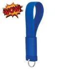 A blue silicone keychain with a WOW! graphic in the top left corner.