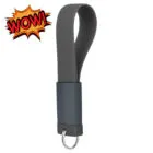 Gray silicone keychain loop with metal ring and a WOW! comic graphic in the corner.