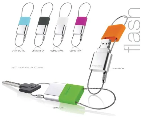 Colorful USB drives with keychain loops in various colors, shown with a key attached.