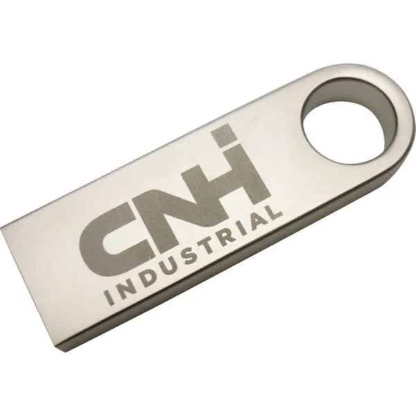 A metallic USB flash drive with the logo CNH INDUSTRIAL engraved on its surface. The drive has a circular loop at one end. The design is sleek and minimalist.