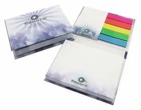 Three notepads, two open showing white paper and colorful sticky tabs in blue, green, yellow, pink.