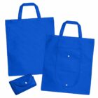 Two blue reusable tote bags, one folded and two open, with handles and snap closures.