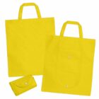 Three bright yellow reusable tote bags, two open with handles and one folded.