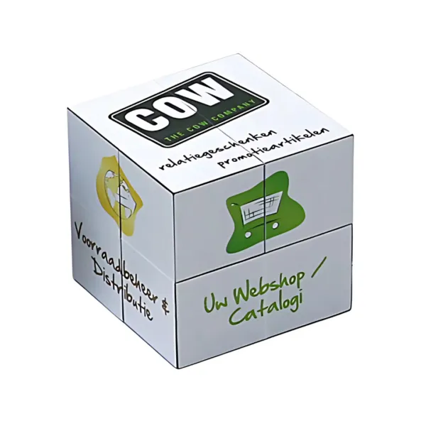 The Fold Out Magic Square Cube is a white cube with text and images linked to The Cow Company. It displays phrases like radaknageschaften and Uw Webshop/Catalogi, alongside cow and warehouse icons, offering an interactive fold-out design.