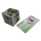 A transparent Paper Pop Up Cube Fab Mailer with an abstract design sits beside a rectangular package featuring robotic arm illustrations, labeled Monahart with a website URL.