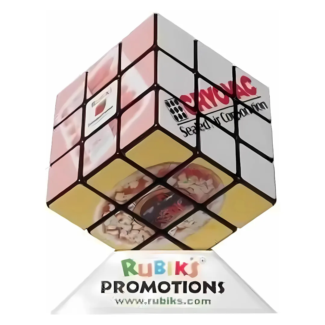 rubik-s-3x3-cube_1 A Rubiks 3x3 Cube features promotional images on each face, mounted on a Rubiks Promotions stand with different product showcases and a website URL below.