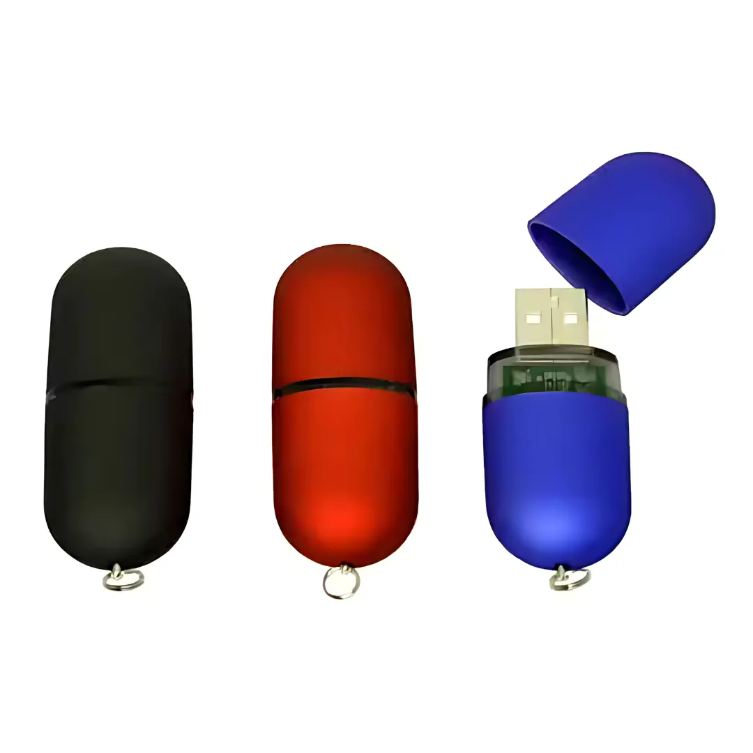 Three The Pill USB drives in black, red, and blue, with the blue one opened.