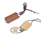 Two Wooden USBs with brown cords on a white background.