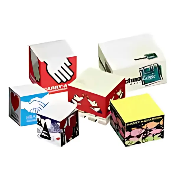 The Adhesive Cubes with Side Print 7x7x7cm feature vibrant side designs like handshakes, hearts, birds, and abstract art. These colorful cardboard boxes form partly obscured cubes with open tops, ideal for adding a unique touch.