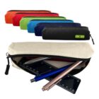 A Canvas Tube Pencil Case - rush in beige, open with pens, ruler, and colorful cases behind.